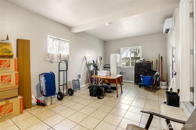 office area with an AC wall unit, light tile patterned floors, baseboards, and beam ceiling