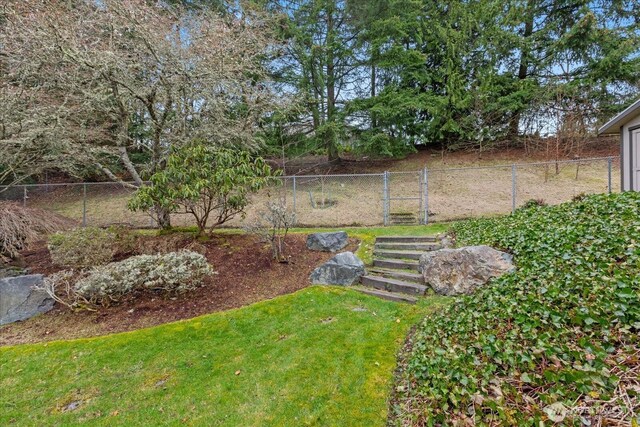 view of yard with fence