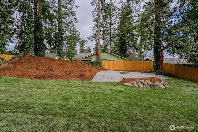 view of yard with a patio and a fenced backyard