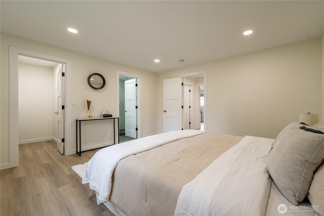 bedroom featuring recessed lighting, baseboards, and light wood-style floors