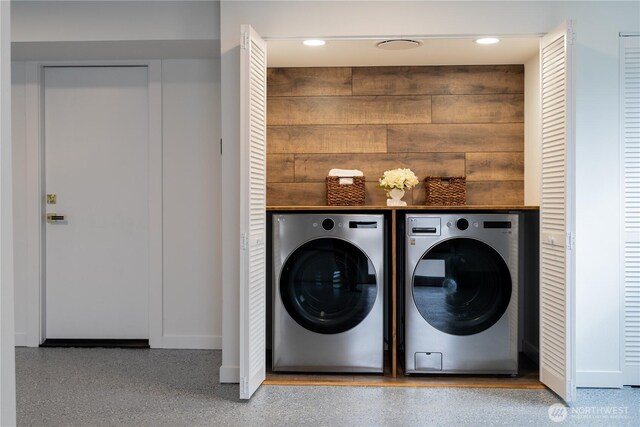 laundry room featuring recessed lighting, laundry area, and washer and dryer