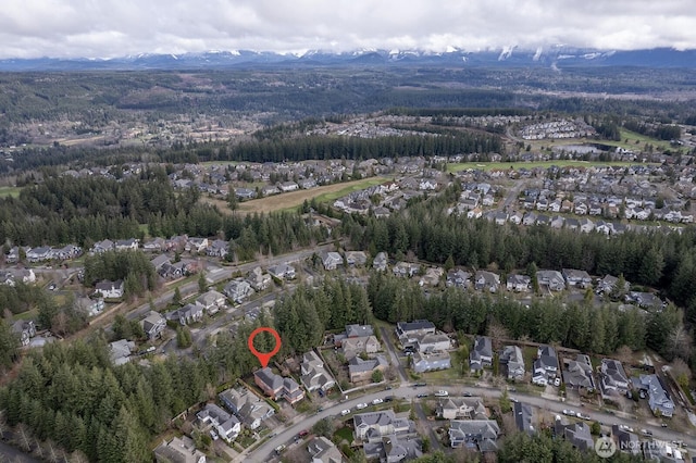 bird's eye view with a forest view