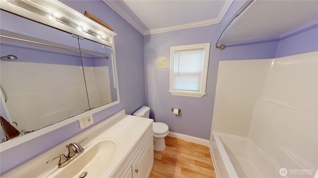 full bath with crown molding, walk in shower, toilet, wood finished floors, and vanity