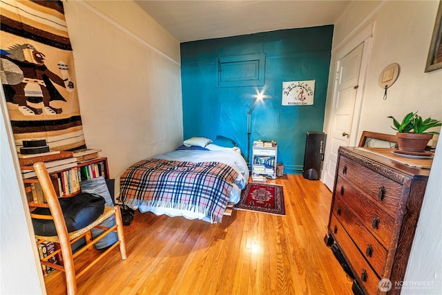 bedroom with light wood-type flooring