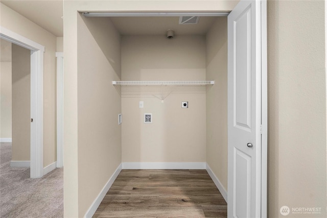 clothes washing area with washer hookup, laundry area, baseboards, and hookup for an electric dryer