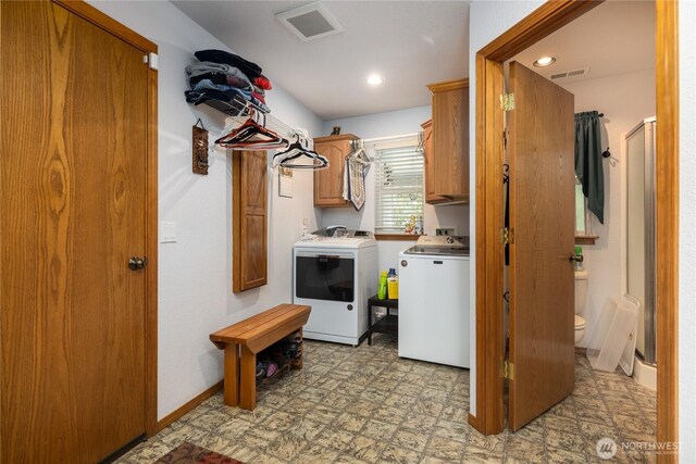 6084 Gartin Pl, Sedro Woolley, WA 98284 - laundry room featuring visible vents, baseboards, recessed lighting, cabinet space, and washing machine and dryer