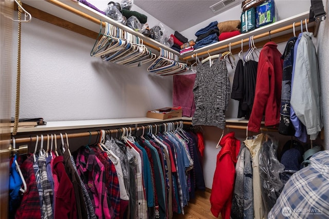6084 Gartin Pl, Sedro Woolley, WA 98284 - walk in closet featuring visible vents and wood finished floors
