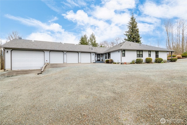 ranch-style house featuring driveway