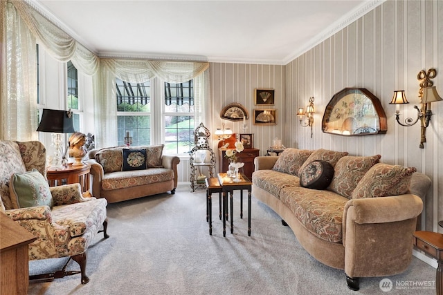 carpeted living area featuring ornamental molding