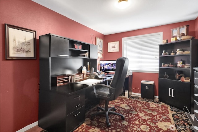 office space featuring baseboards