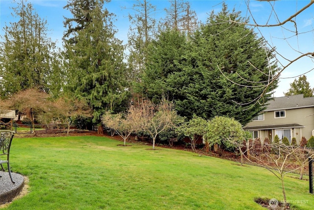 view of yard with fence