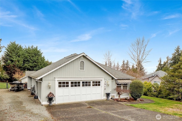 exterior space featuring driveway and an attached garage