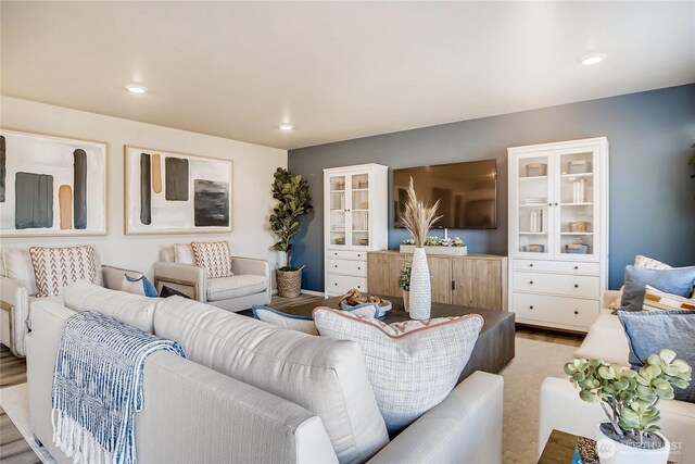 living area featuring recessed lighting and wood finished floors