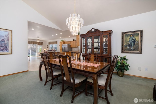 dining area featuring lofted ceiling, a notable chandelier, light colored carpet, and baseboards