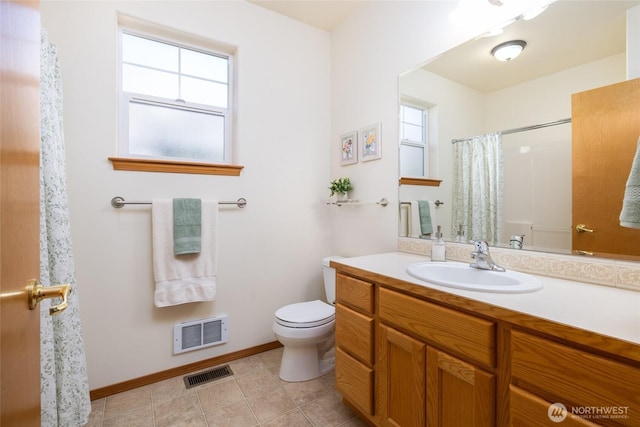 full bath with visible vents, toilet, vanity, and a shower with curtain