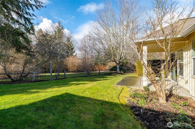 view of yard with fence