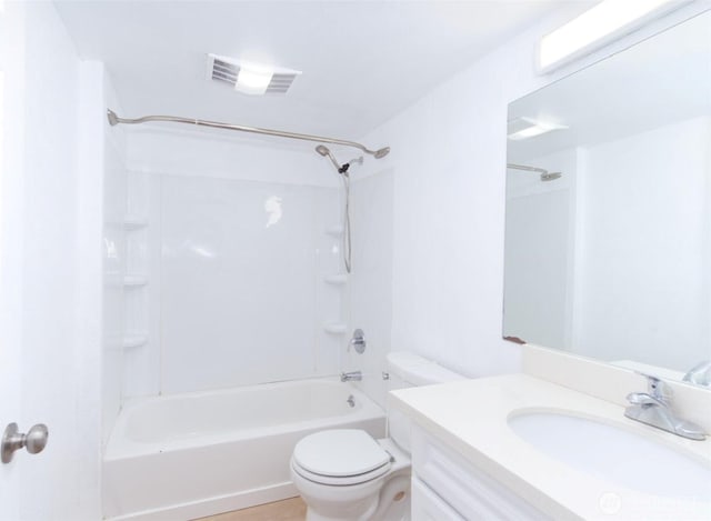 full bath featuring vanity, toilet, washtub / shower combination, and visible vents