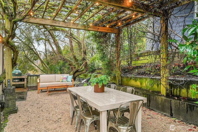 view of patio / terrace featuring outdoor lounge area, outdoor dining area, and a pergola