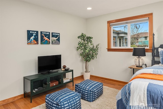 bedroom featuring recessed lighting, baseboards, and wood finished floors