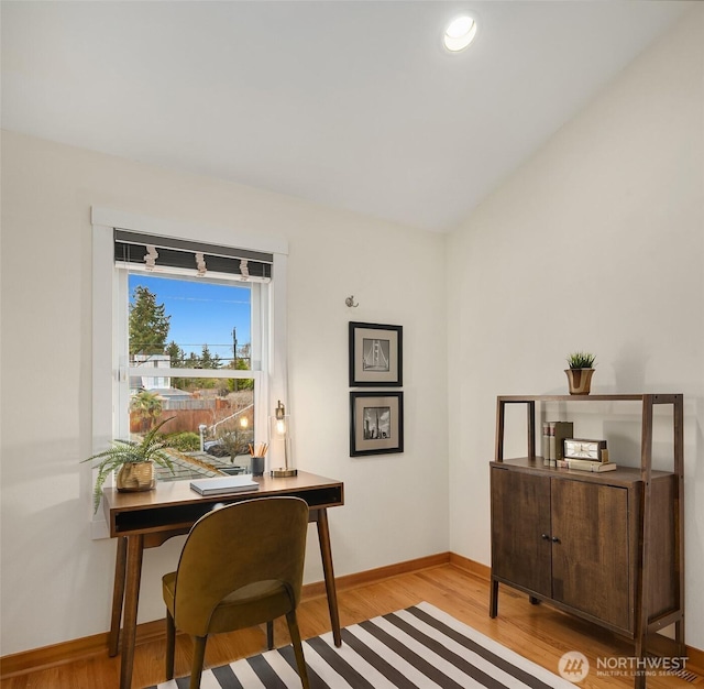 office space with light wood-style flooring, recessed lighting, and baseboards