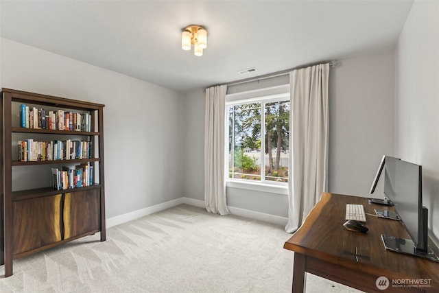 office with carpet flooring, baseboards, and visible vents