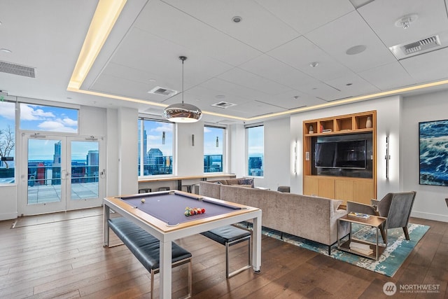 rec room featuring visible vents, french doors, and hardwood / wood-style flooring