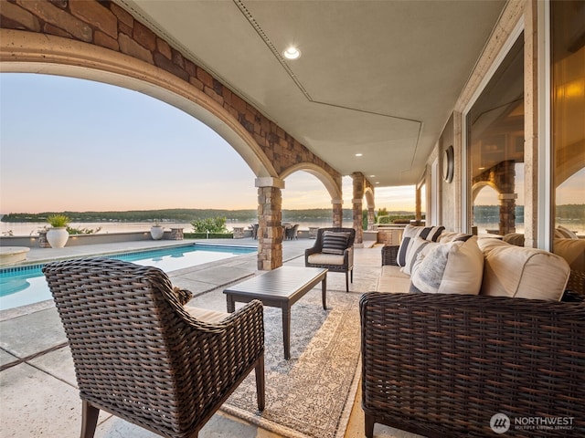 view of patio featuring outdoor lounge area and an outdoor pool