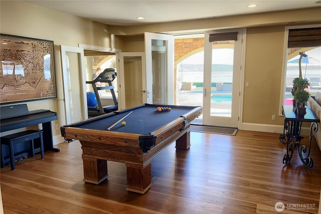 recreation room featuring billiards, wood finished floors, baseboards, recessed lighting, and arched walkways