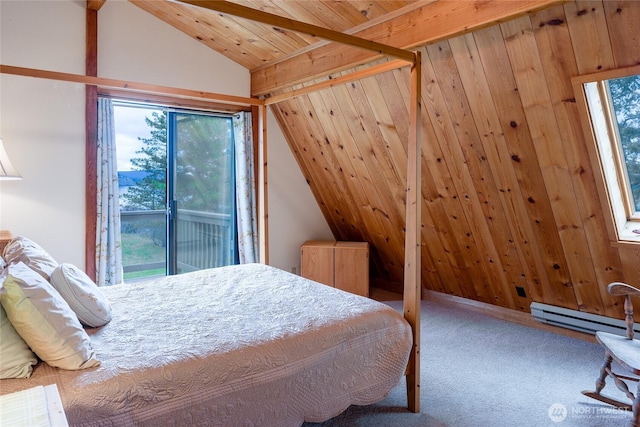 239 Shoreland Dr, Lopez Island, WA 98261 - bedroom featuring vaulted ceiling, wood walls, baseboard heating, and carpet floors