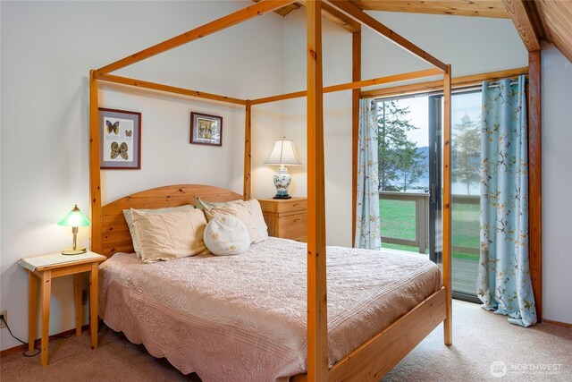 239 Shoreland Dr, Lopez Island, WA 98261 - bedroom featuring lofted ceiling, carpet, and access to exterior