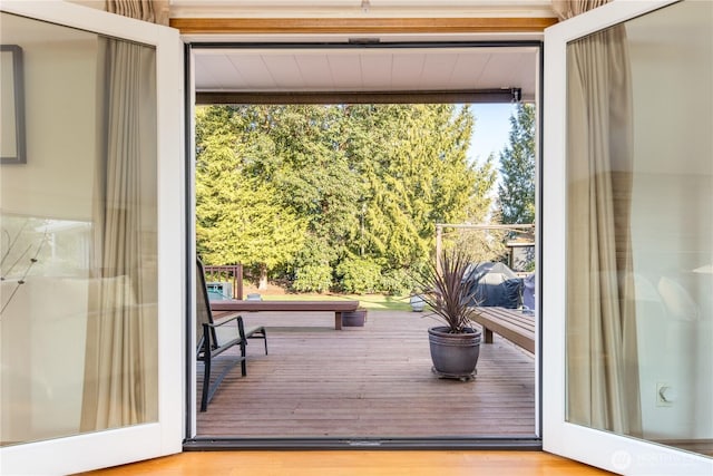 entryway with wood finished floors