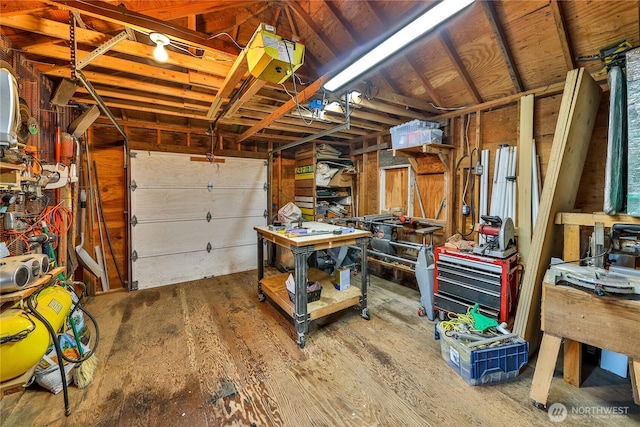 garage featuring a workshop area