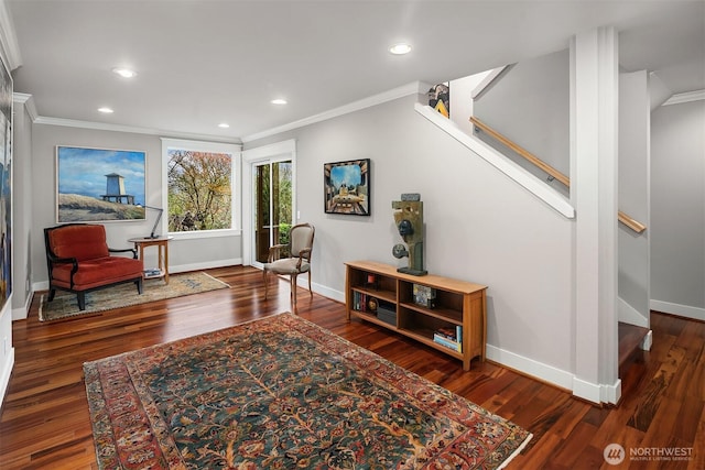 sitting room featuring recessed lighting, baseboards, wood finished floors, and ornamental molding