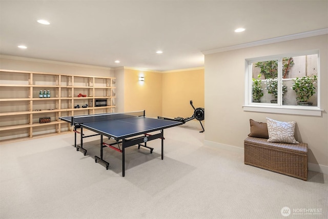 recreation room with recessed lighting and baseboards