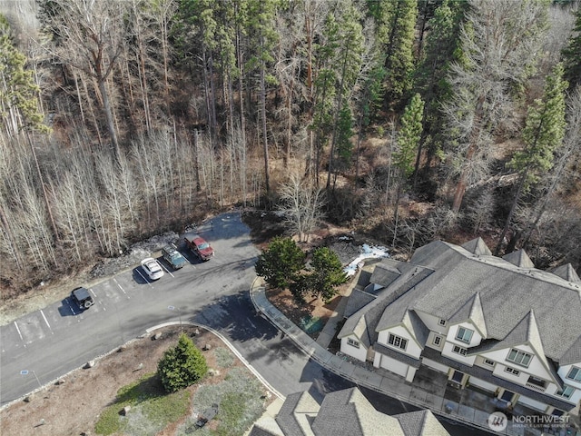 aerial view featuring a forest view