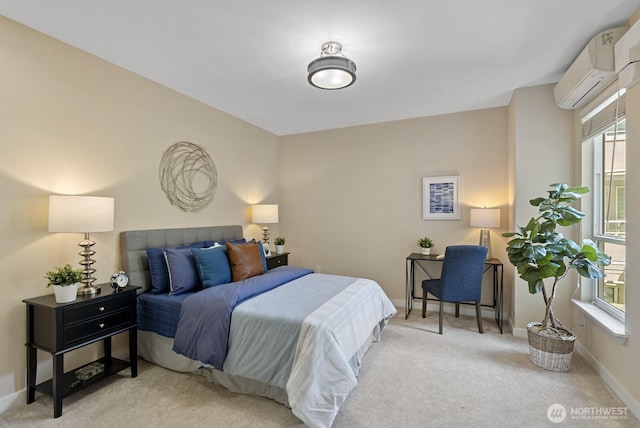 carpeted bedroom with baseboards and a wall unit AC