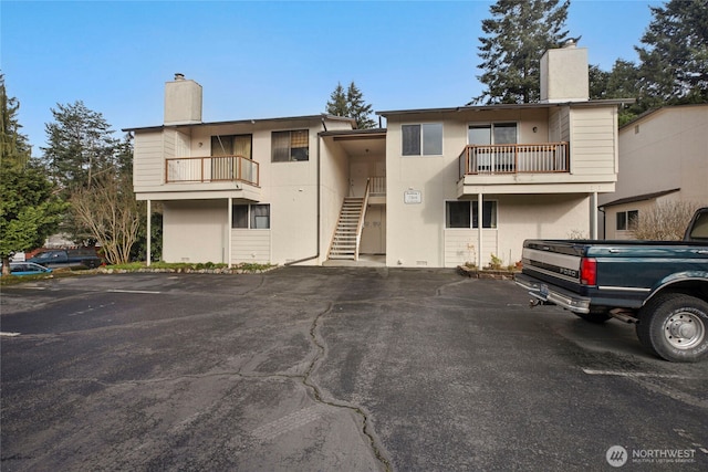 view of property featuring stairway