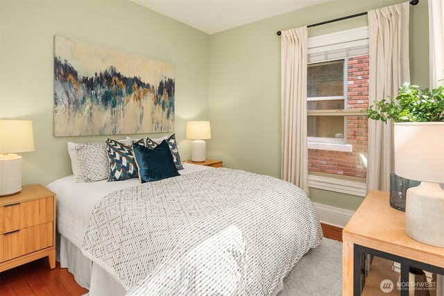 bedroom featuring wood finished floors