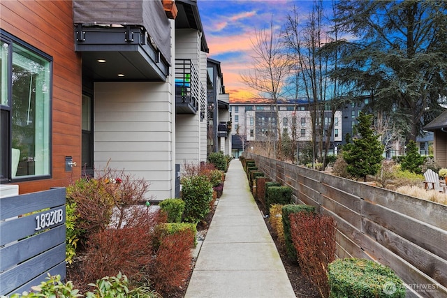 view of property exterior at dusk