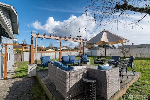 view of patio featuring an outdoor living space and a fenced backyard