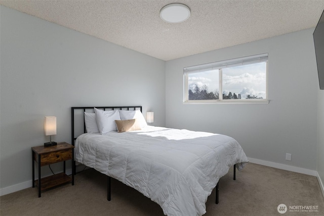 bedroom with baseboards, light colored carpet, and a textured ceiling