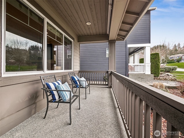 balcony featuring a porch