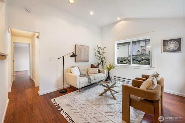 living area with recessed lighting, lofted ceiling, baseboard heating, and wood finished floors