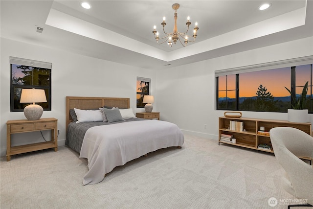 bedroom with baseboards, a chandelier, light carpet, recessed lighting, and a raised ceiling