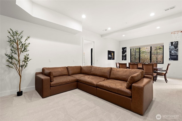 living area featuring light carpet, visible vents, recessed lighting, and baseboards