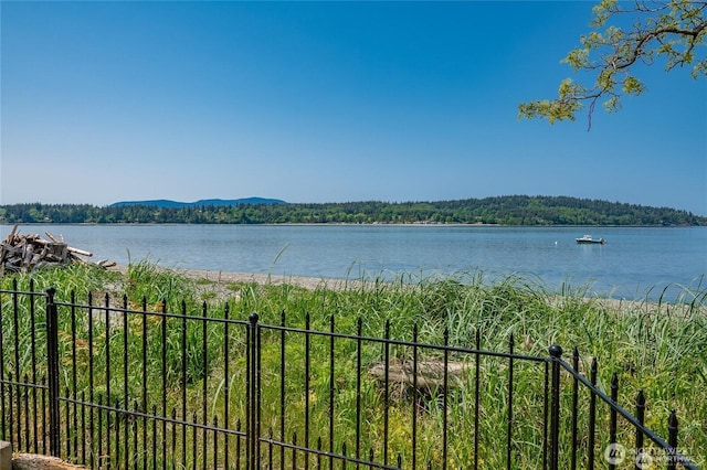 view of water feature featuring fence