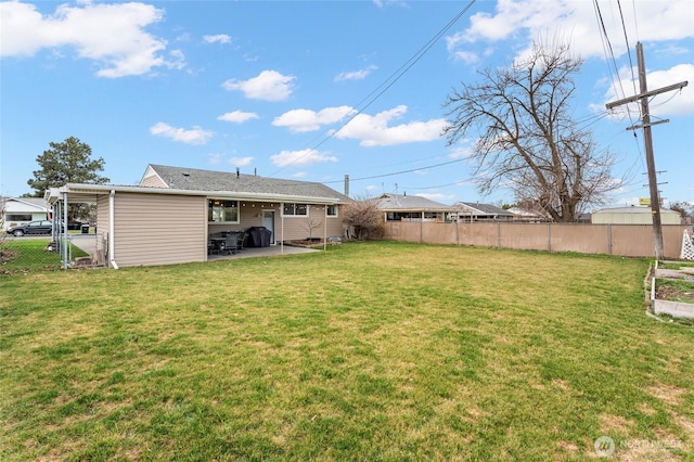 view of yard with a patio area and a fenced backyard