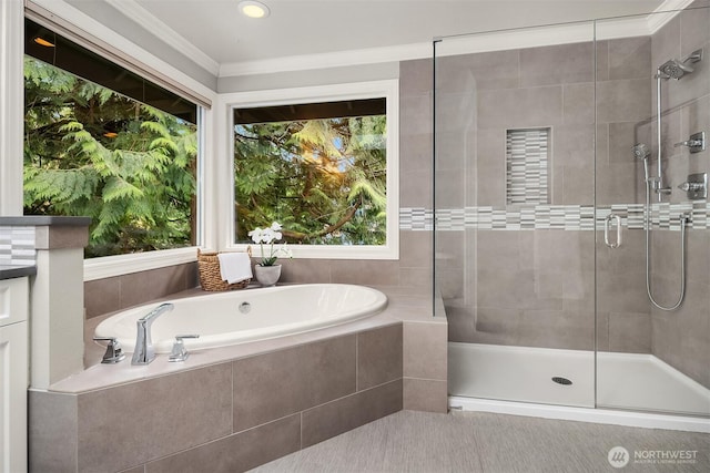 full bathroom with a bath, a shower stall, and ornamental molding