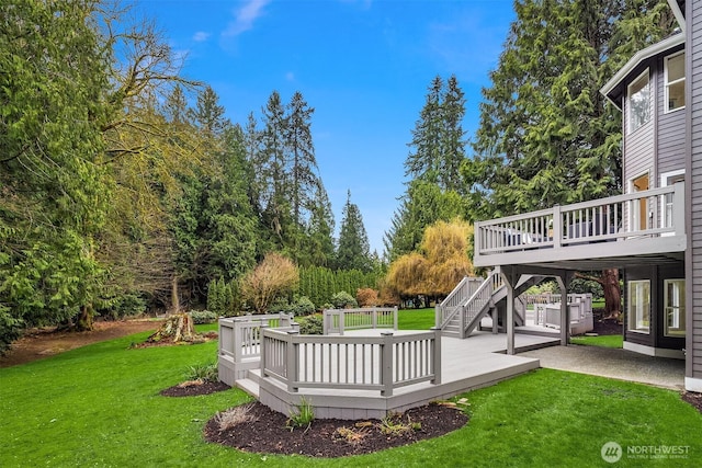 view of yard with stairway, a patio, and a deck