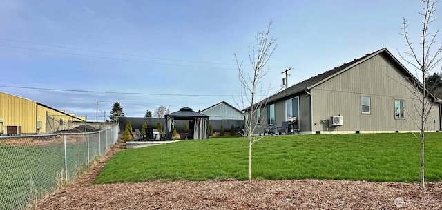 view of yard featuring a gazebo and fence